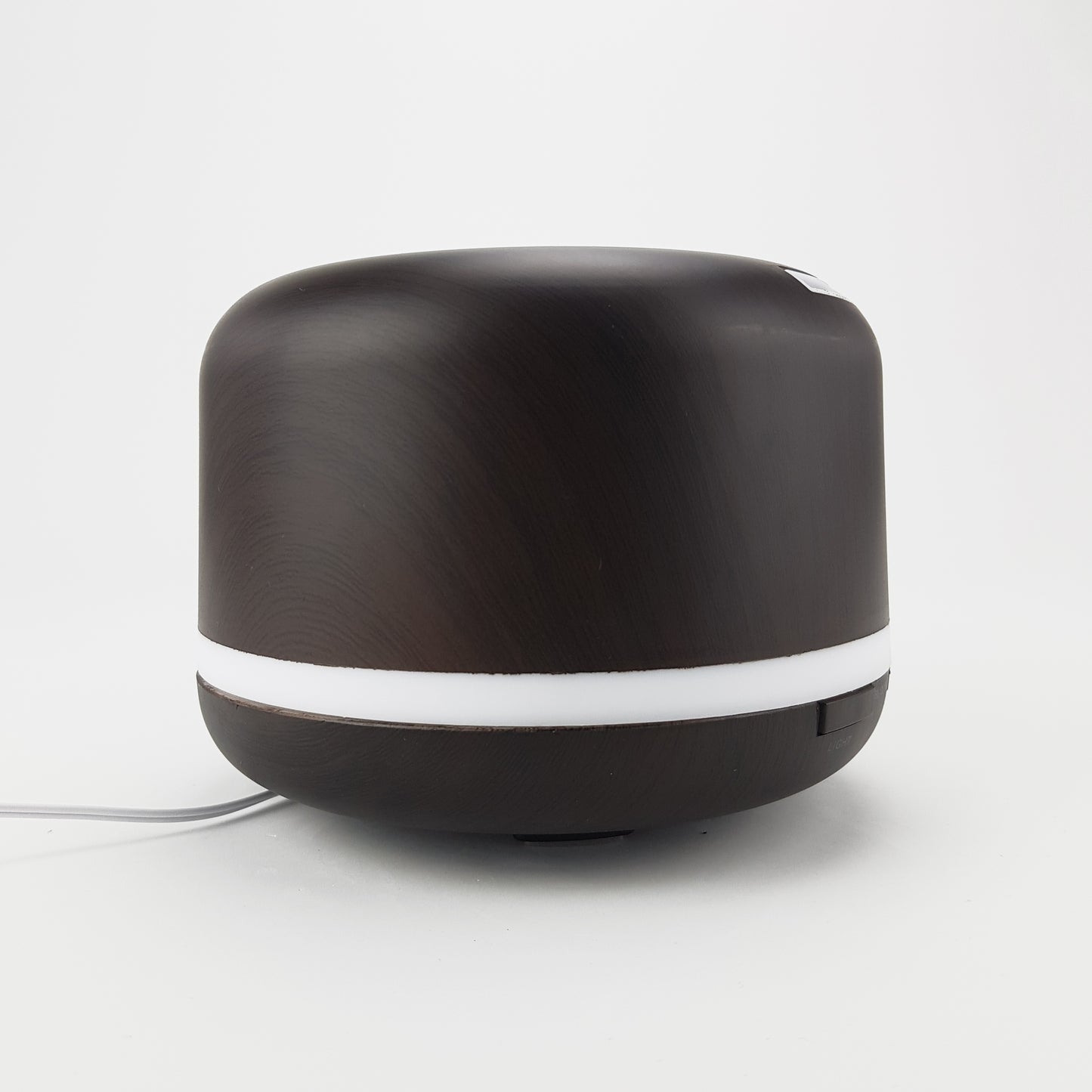 Difusor de aromas circular. Color marrón oscuro. - Oma Home
