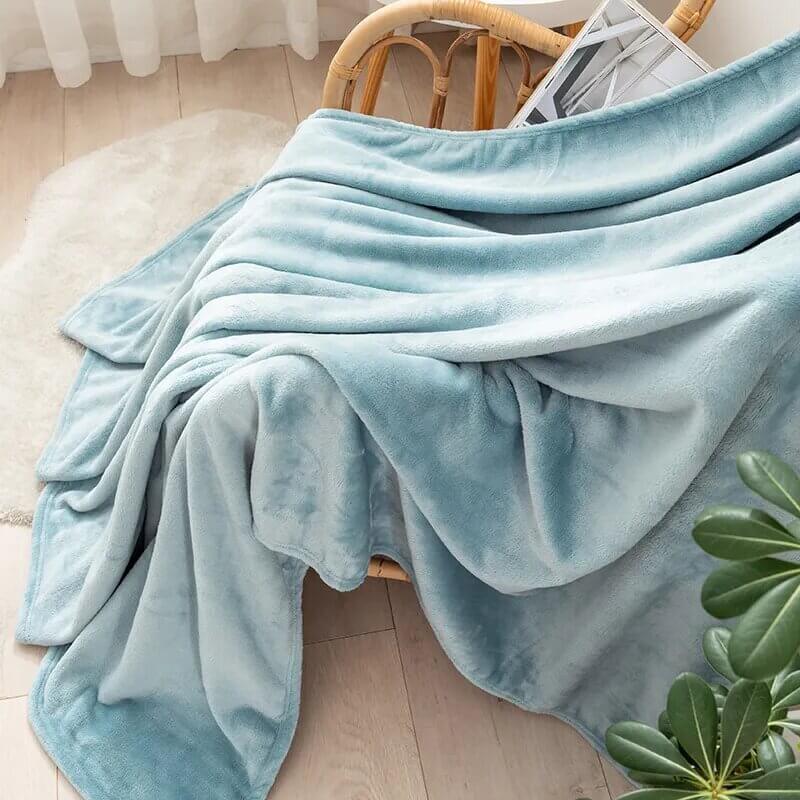 Manta polar azul para sofá y cama, grande y tacto suave.