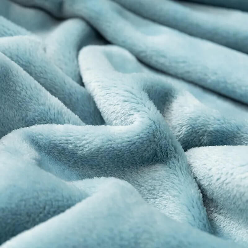 Manta polar azul para sofá y cama, grande y tacto suave.
