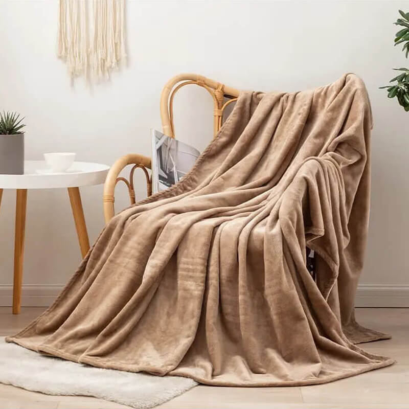 Manta polar beige para sofá y cama, grande y tacto suave.