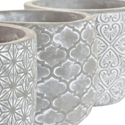 Macetero de Cemento Elegante y Duradero con forma geométrica de estrellas. Ideal para Exteriores e Interiores.