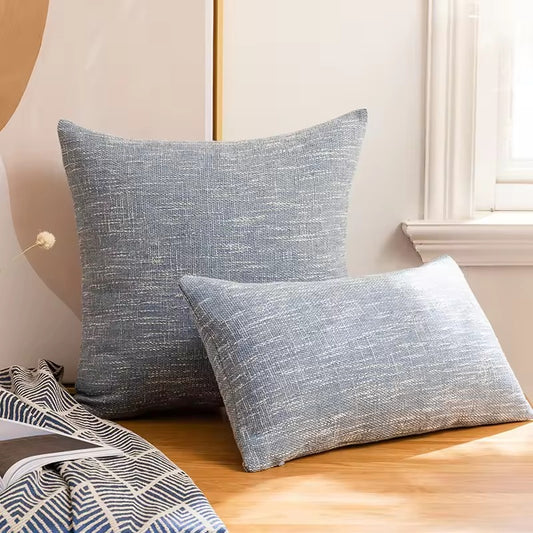 Plain blue cushion cover with relief.