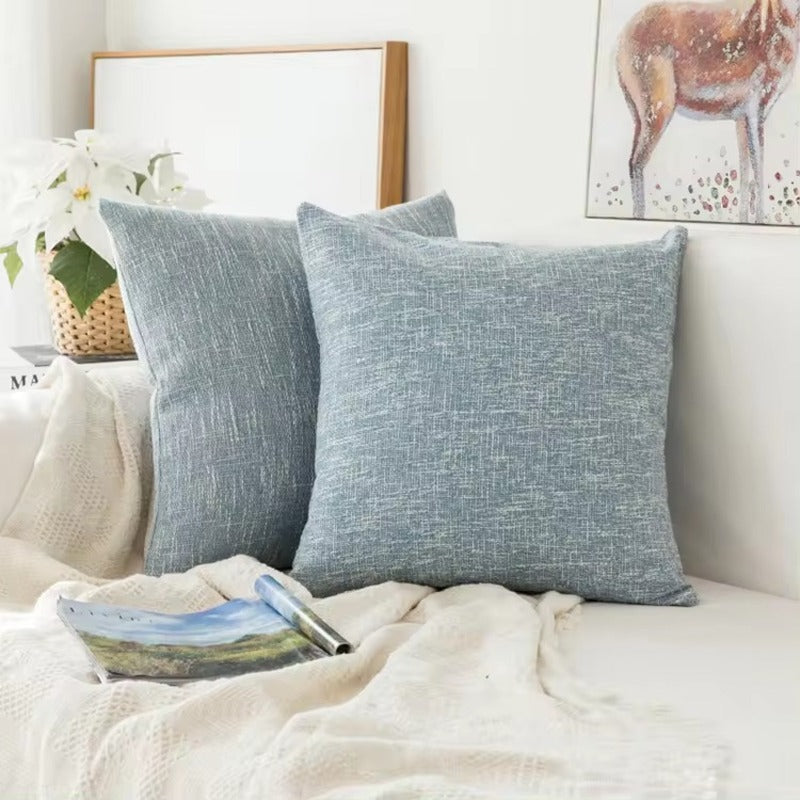 Plain blue cushion cover with relief.