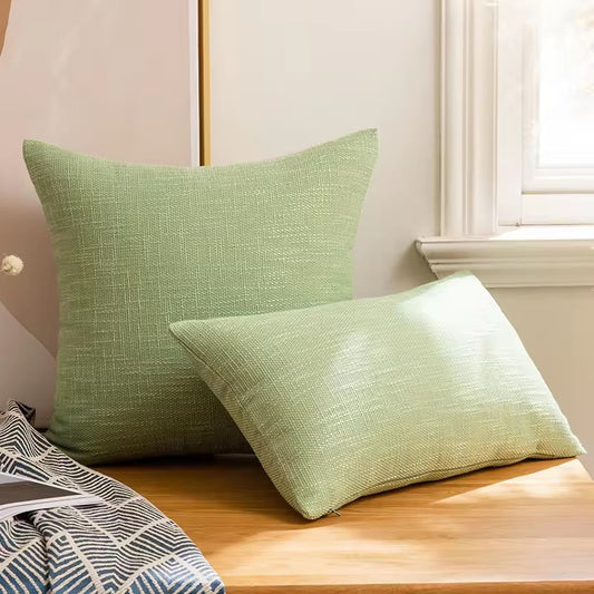 Plain green cushion cover with relief.