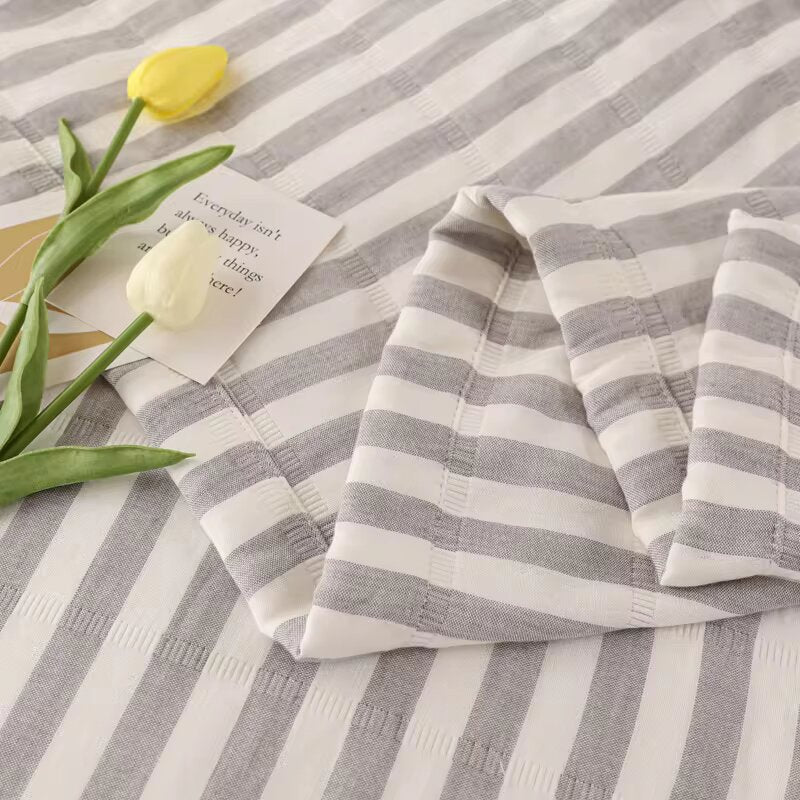 Cotton bedspread. gray stripes.