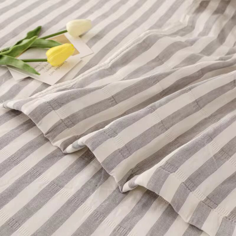 Cotton bedspread. gray stripes.