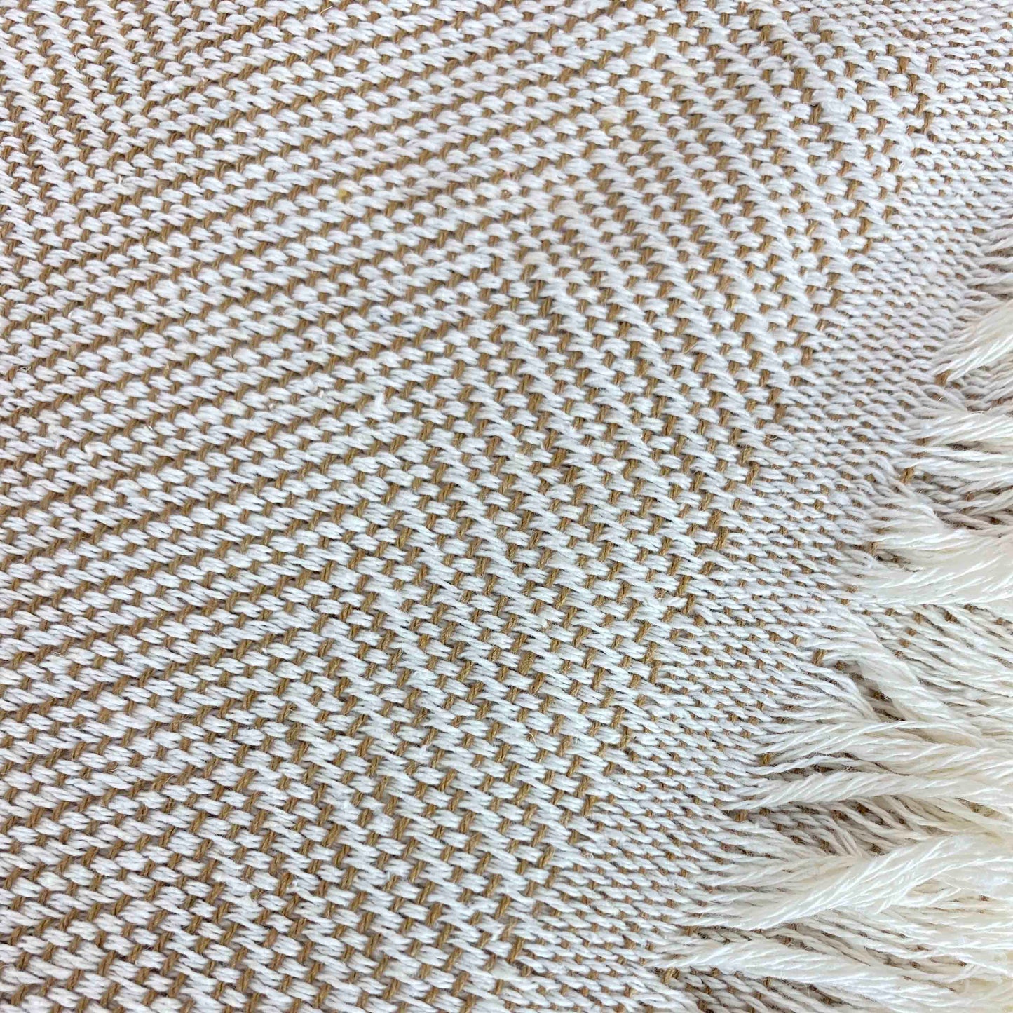 Multipurpose bedspread for sofa or bed with fringes. Beige and Ecru color.