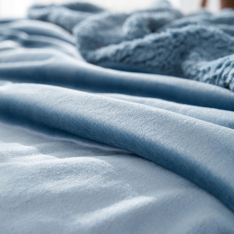 Manta borreguito sherpa y extra suave reversible. Color azul oscuro.