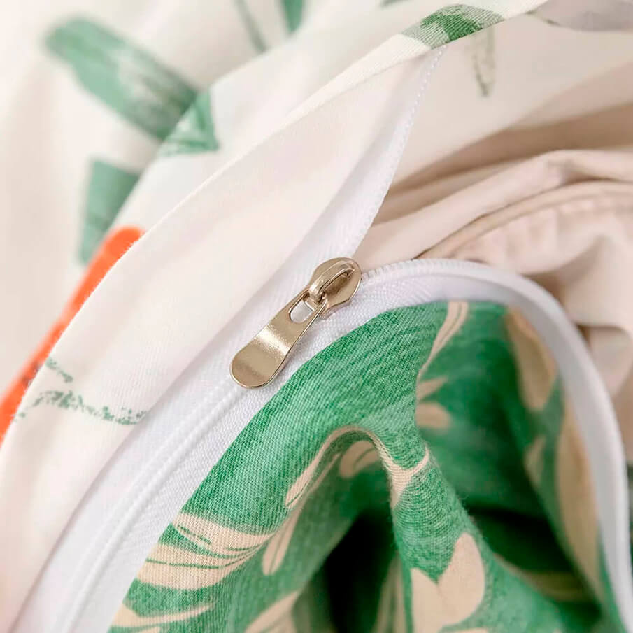 Detalle del cierre con cremallera oculta en la parte inferior de la funda nórdica para fácil colocación.