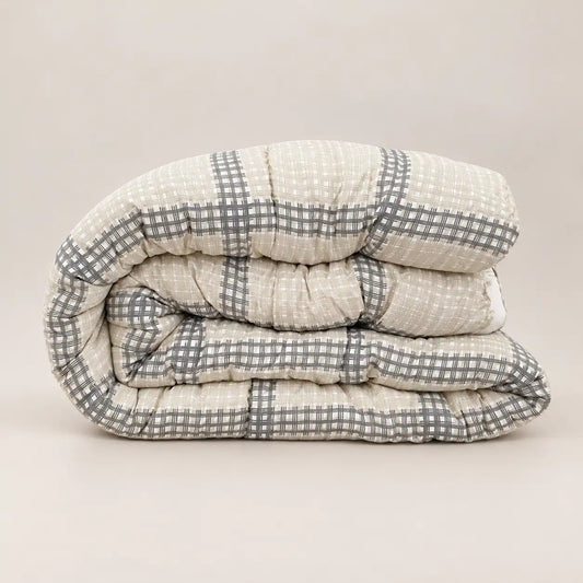 Side view of the lightweight 200gsm microfiber duvet, ideal for autumn and spring.