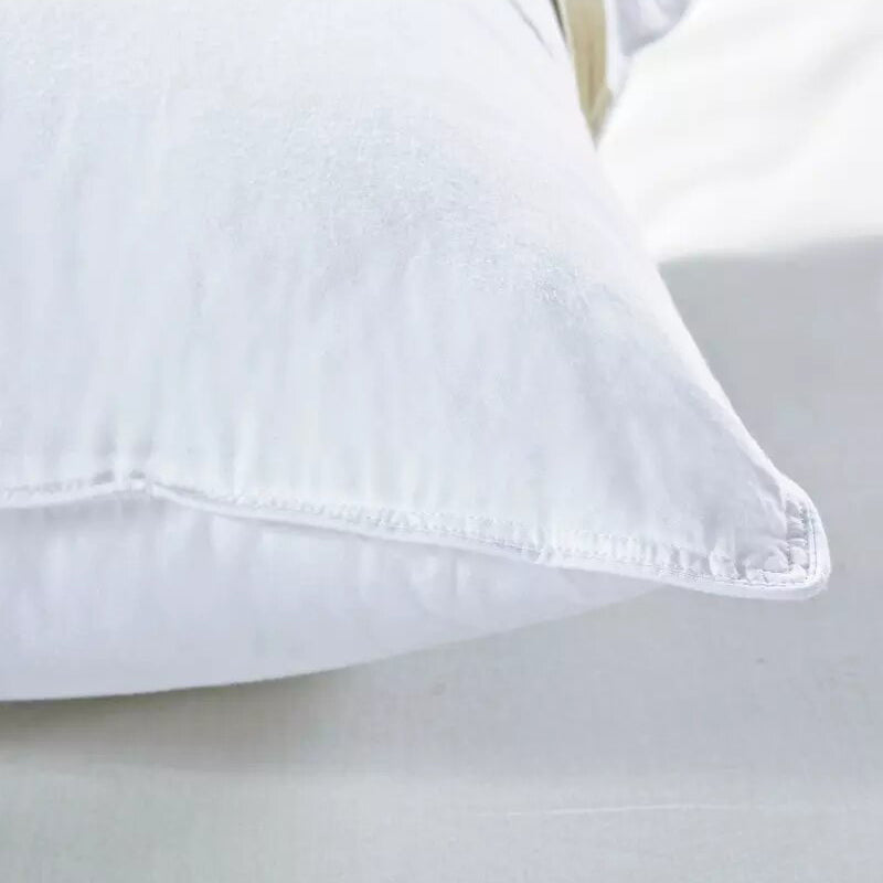 Feather touch fiber pillow. Medium-High Firmness