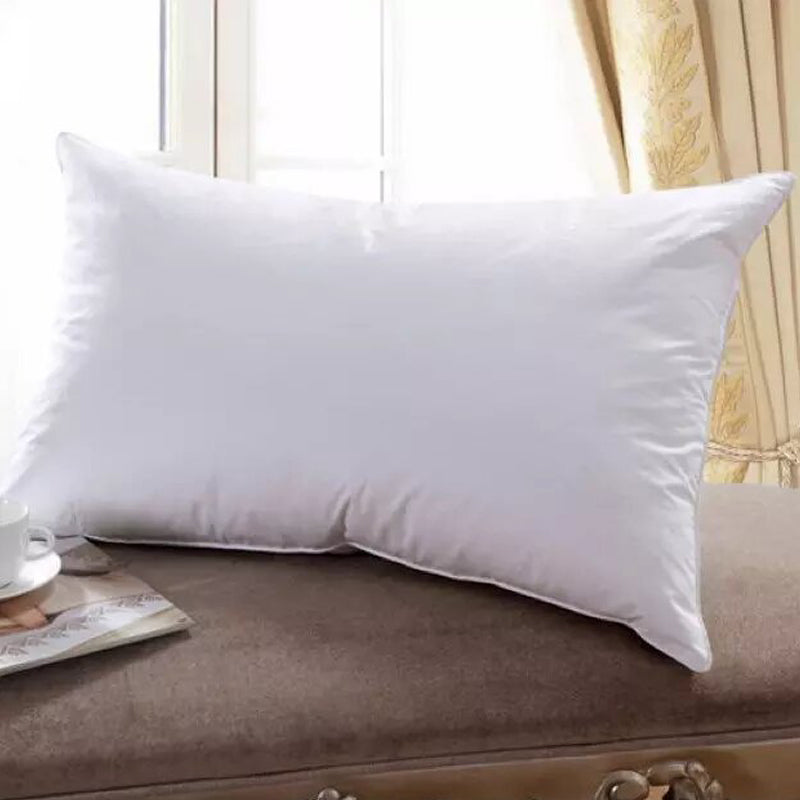 Feather touch fiber pillow. Medium-Low Firmness