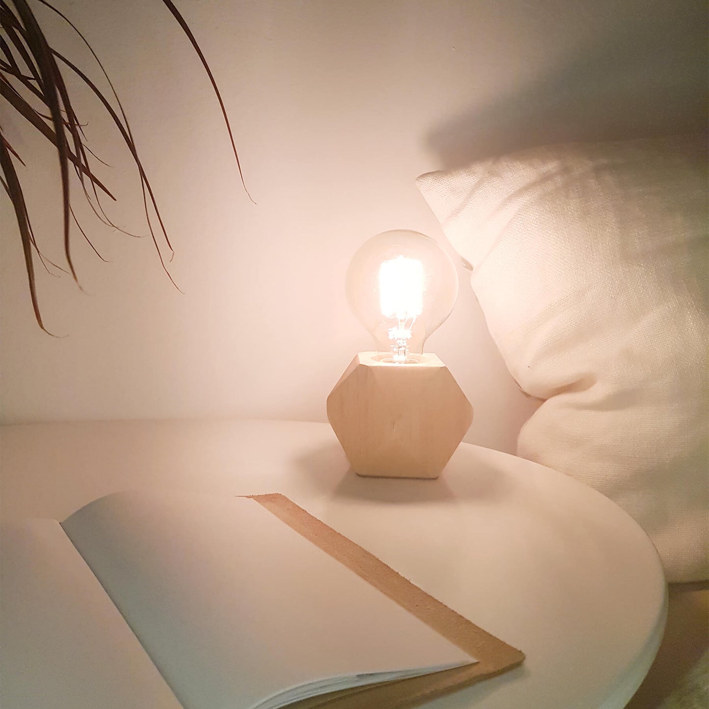 Bedside table lamp with light bulb. Wood with diamond base.